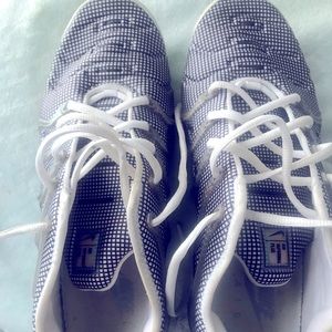 Nike Air Vapormax Plus running shoe shock absorbent.  Outstanding comfort.